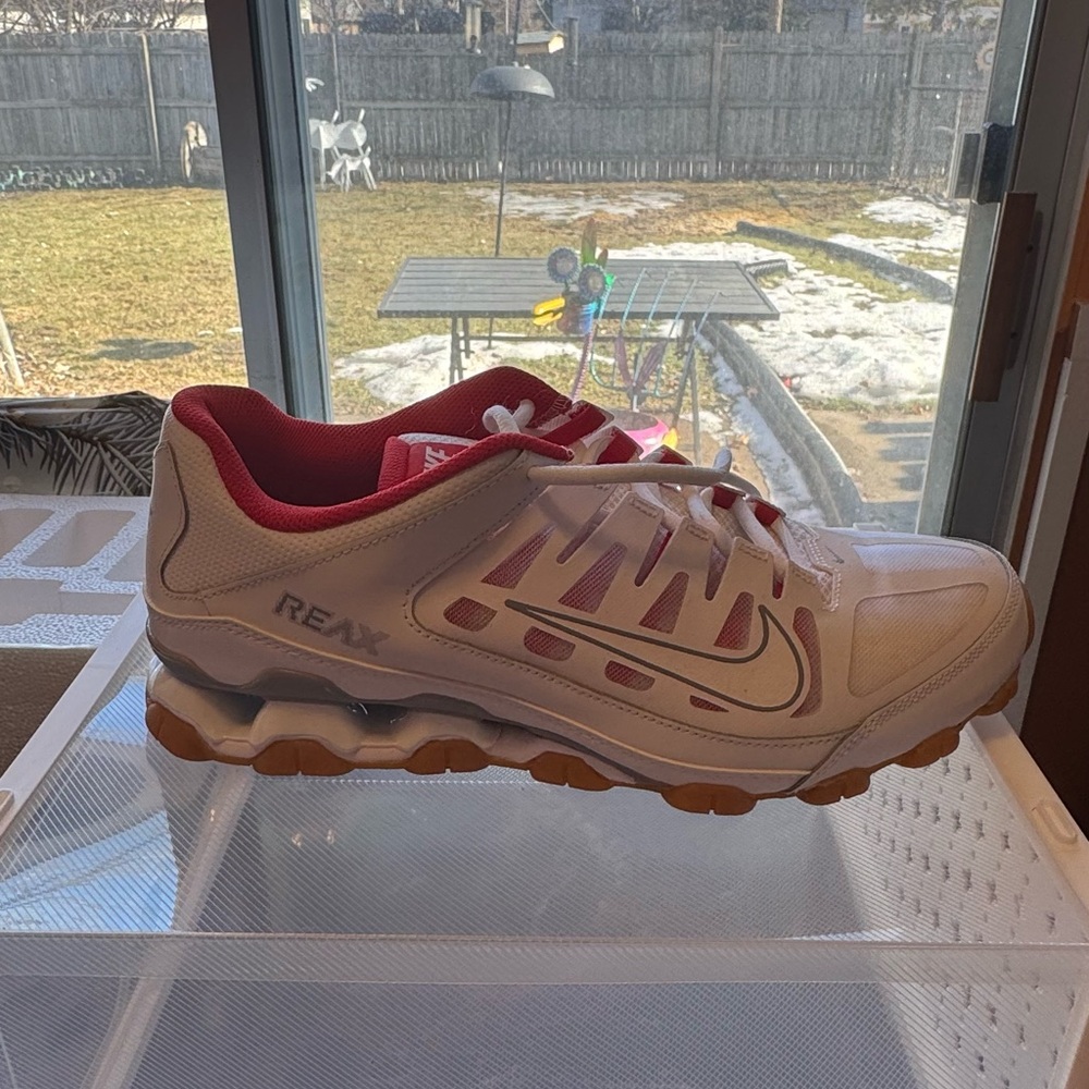 Nike White and Red Athletic Reax shoes.